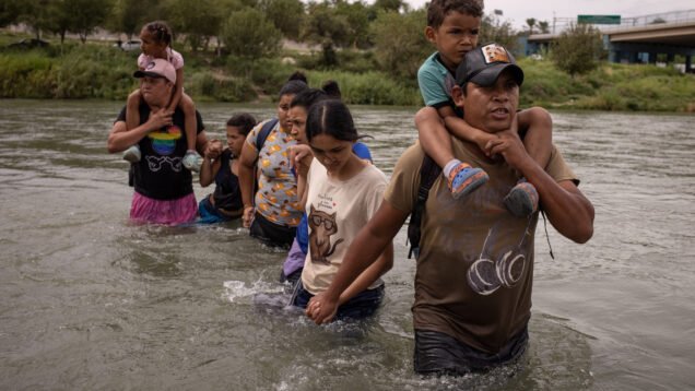 Migrants wade into the U.S. in Eagle Pass, Texas